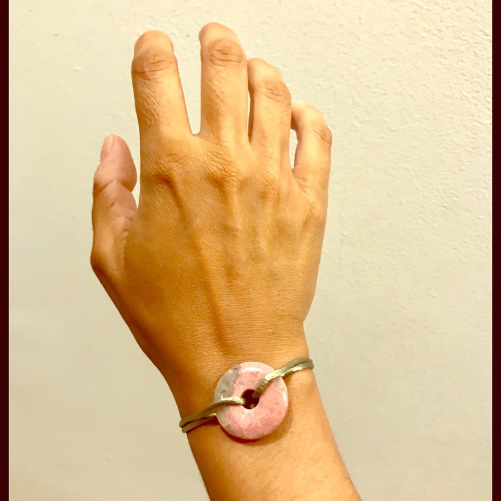 One rhodochrosite and silk bracelet.